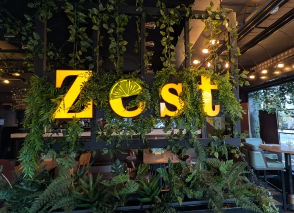 Zest restaurant interior with greenery in York near Hocus Pocus Tiny Hotel